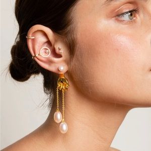 Anissa Kermiche grab them by the balls earring